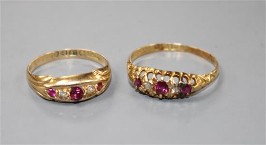 Two early 20th century 18ct gold, ruby and diamond set dress rings,